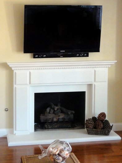 Woodlook Fireplace Mantel by Precast Innovations, Inc.